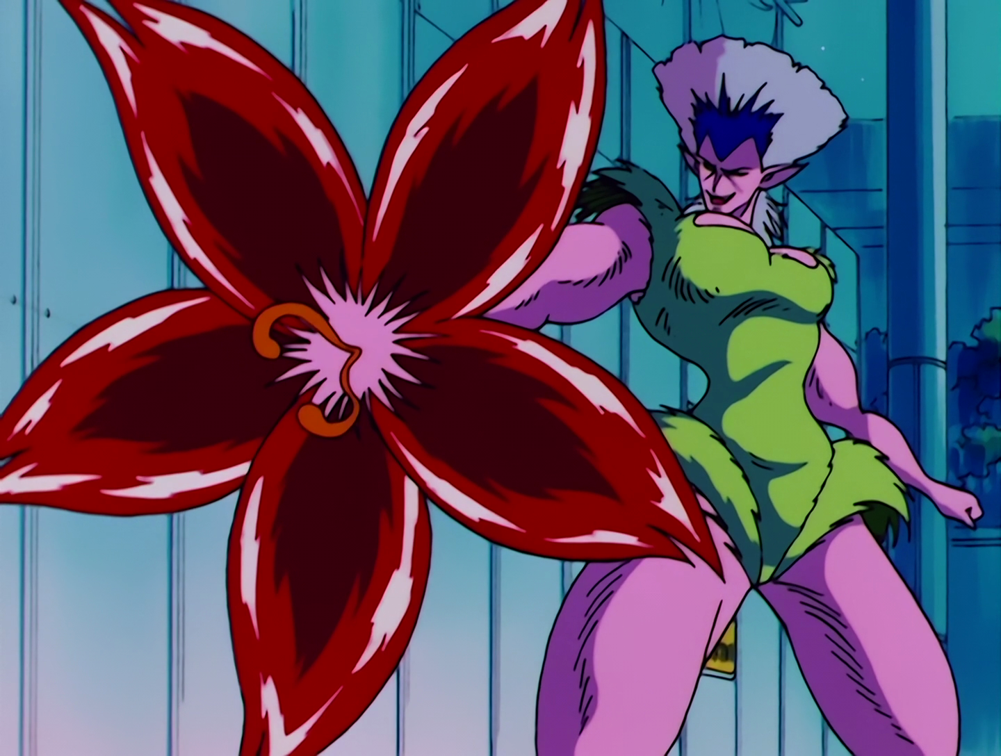 Vampir, a Cardian from Sailor Moon episode 47. She’s a buff lady with lavender skin and spiked blue hair. She’s wearing a green leotard that looks like it’s made of some kind of plant material. One of her arms ends in a giant red flower that she’s pointing at the viewer.